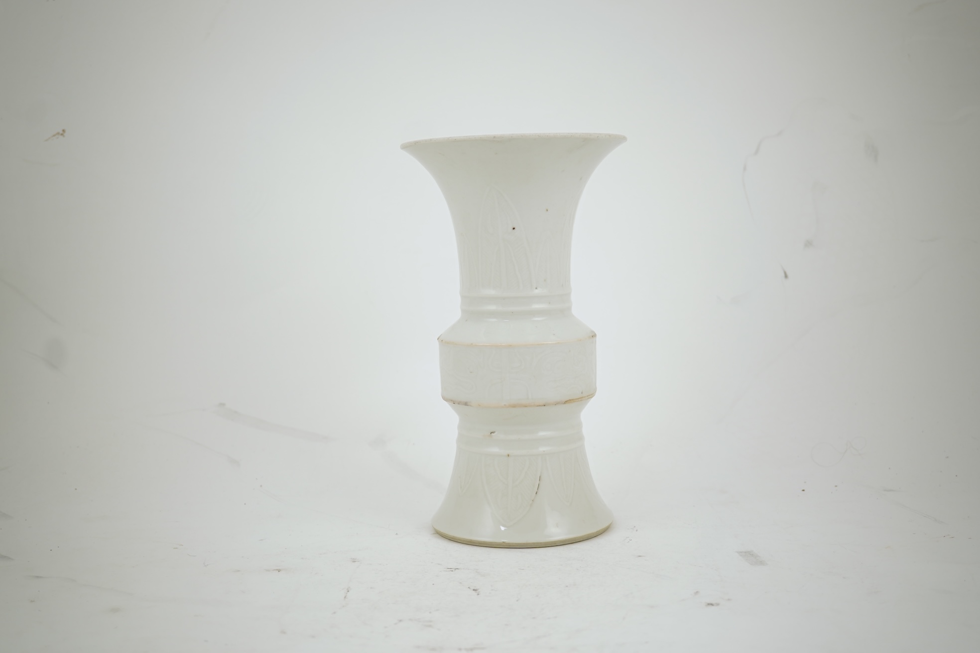 A Chinese white glazed 'gu' vase, 19th century